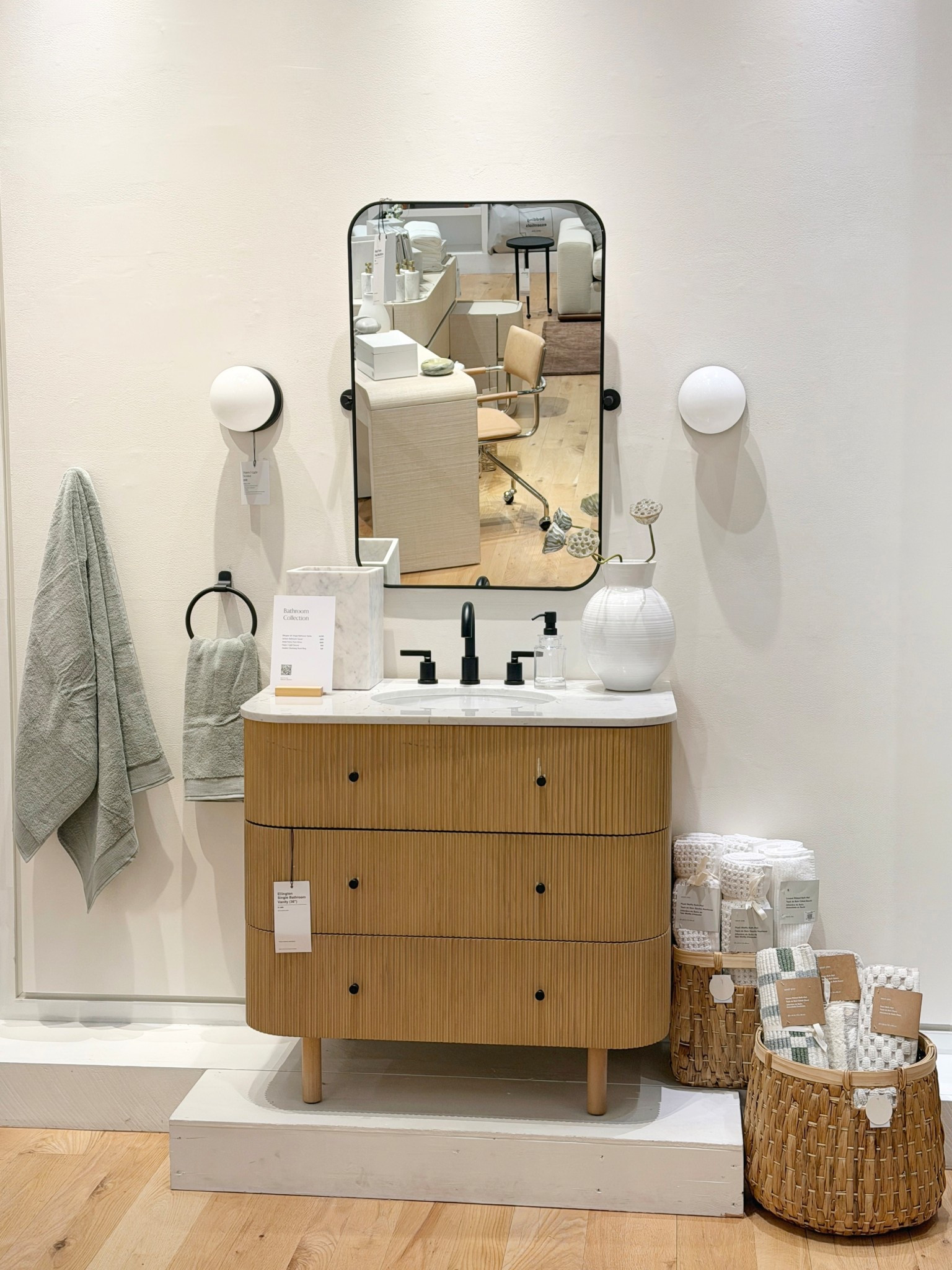 Designer look for the bathroom! ✨ The Ellington Vanity from West Elm is such a statement modern piece with its beautiful fluted design and warm natural oak finish. 🤎 Shown here in the 36” Blonde finish with Dark Bronze hardware, it feels elevated and very contemporary. 💫 Plus, it offers great built-in storage for bathroom essentials. Also comes in two other finishes. Linked it here! 😍 #WestElm #BathroomInspo #ModernBathroom 

#LTKHome #LTKSaleAlert