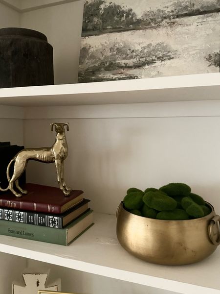 Shelf styling can be so easy and affordable with this gold dish and faux moss covered rocks. Add books stacks and fun conversation home decor piece and you have an elevated look. 

#LTKfindsunder50 #LTKhome #LTKSeasonal