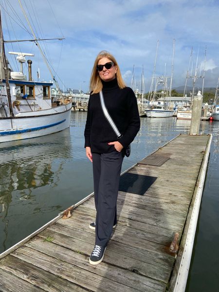Stylish athleisure pants:wide-leg! Comfy and cute. Size down, as per the sales rep in the store and based on my own experience. I paired her with a slouchy side-slut cashmere turtleneck, sneaks and casual bag.

#LTKstyletip #LTKSeasonal #LTKtravel