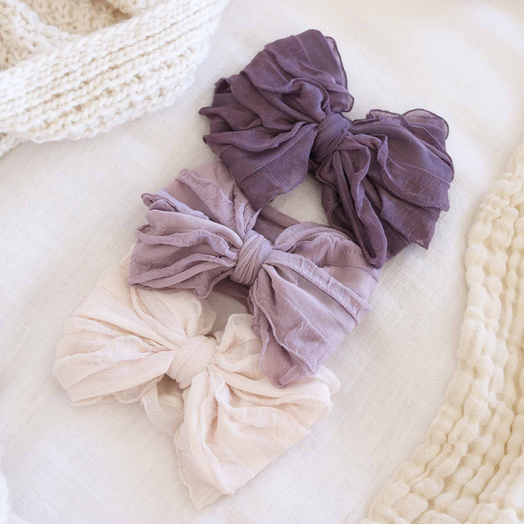 Large Ruffle Knit Bow | Purples | Caden Lane