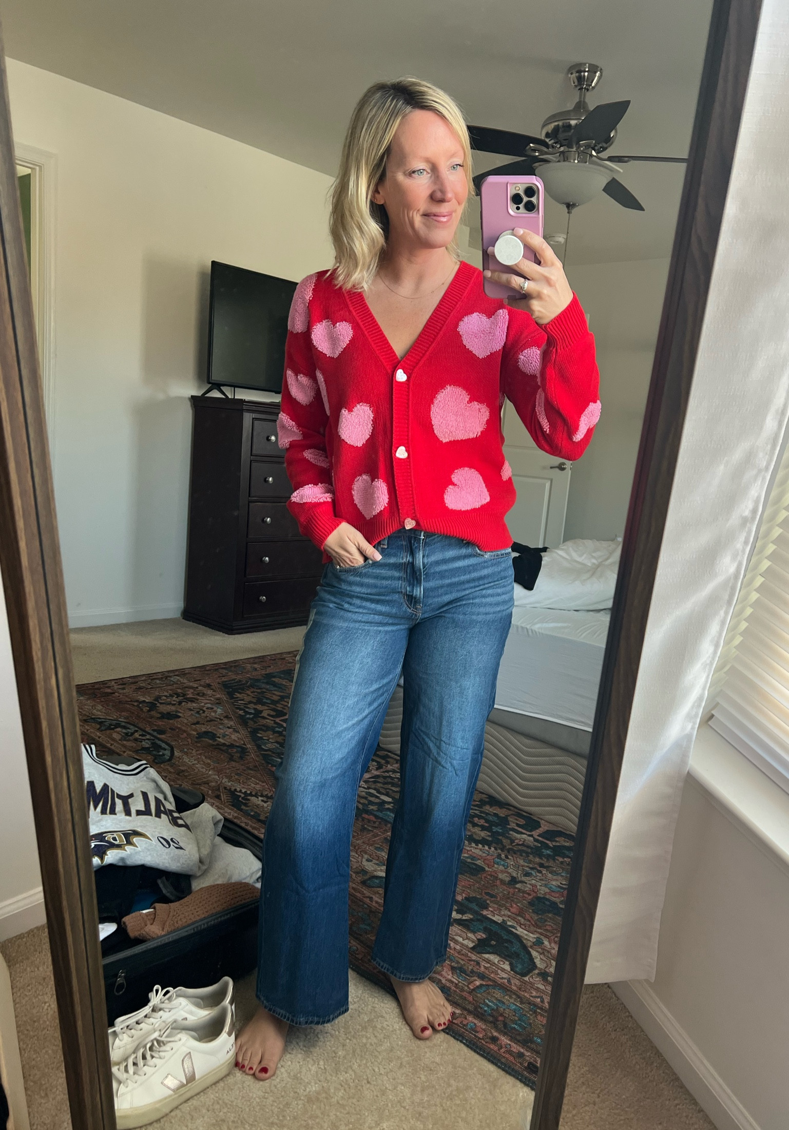 The cutest outfit for Valentine’s Day! Love these high-waisted baggy cropped jeans. I’m 5’4” and they are the perfect length. Wearing a size 2 regular. Sweater is XS!