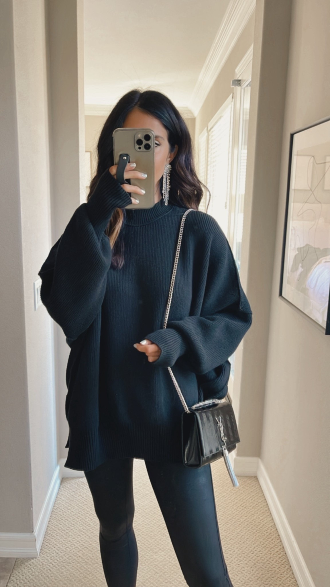 One of my favorite holiday party outfits, an oversized cozy sweater and faux leather leggings. Add a fun statement earring and heels #stylinbyaylin #fauxleggings #ootd

#LTKFindsUnder100 #LTKOver40 #LTKHoliday