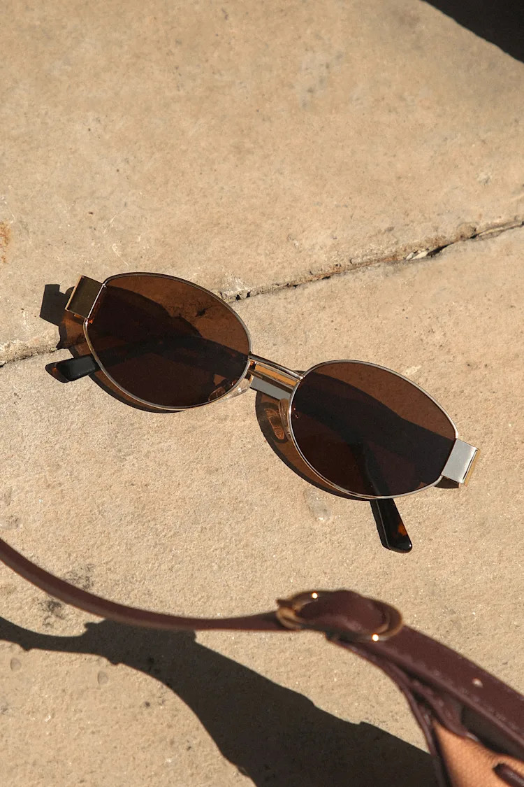 Trendsetting Take Gold and Brown Oval Sunglasses
            Lulus
         $19
        Product R... | Lulus