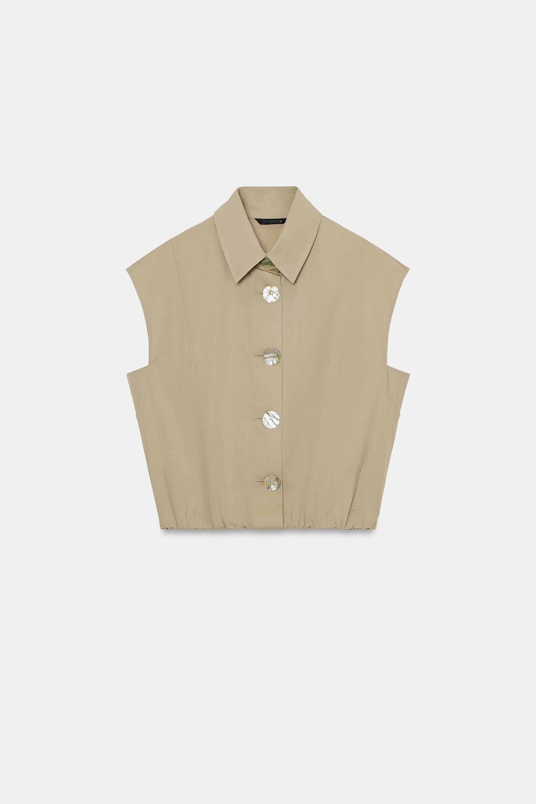 Le mannequin mesure : 173 cmTop avec col \u00e0 revers et sans manches. Bas \u00e9lastique. Ferm... | Zara US