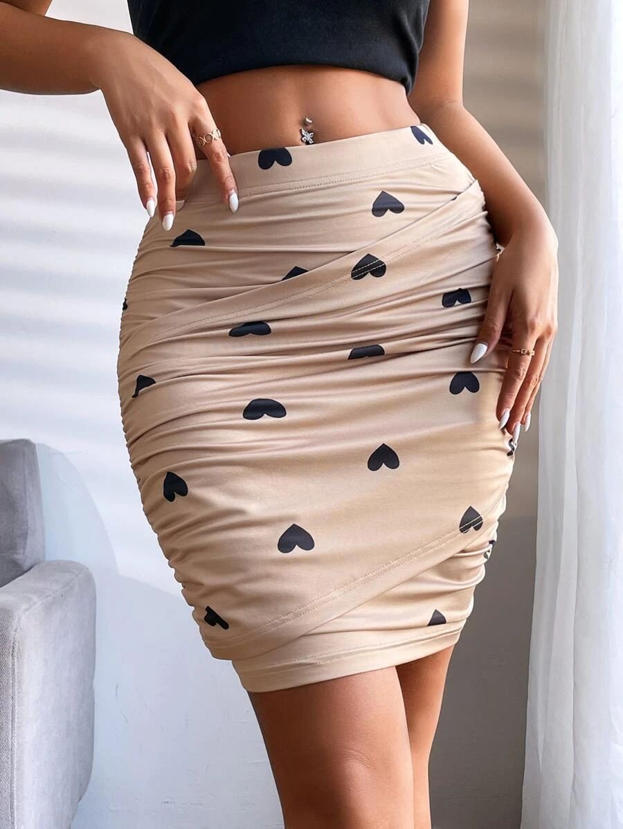 Heart Print Ruched Bodycon Skirt SKU: sw2211120509974579New$9.00Make 4 payments of $2.25 $8.55Joi... | SHEIN