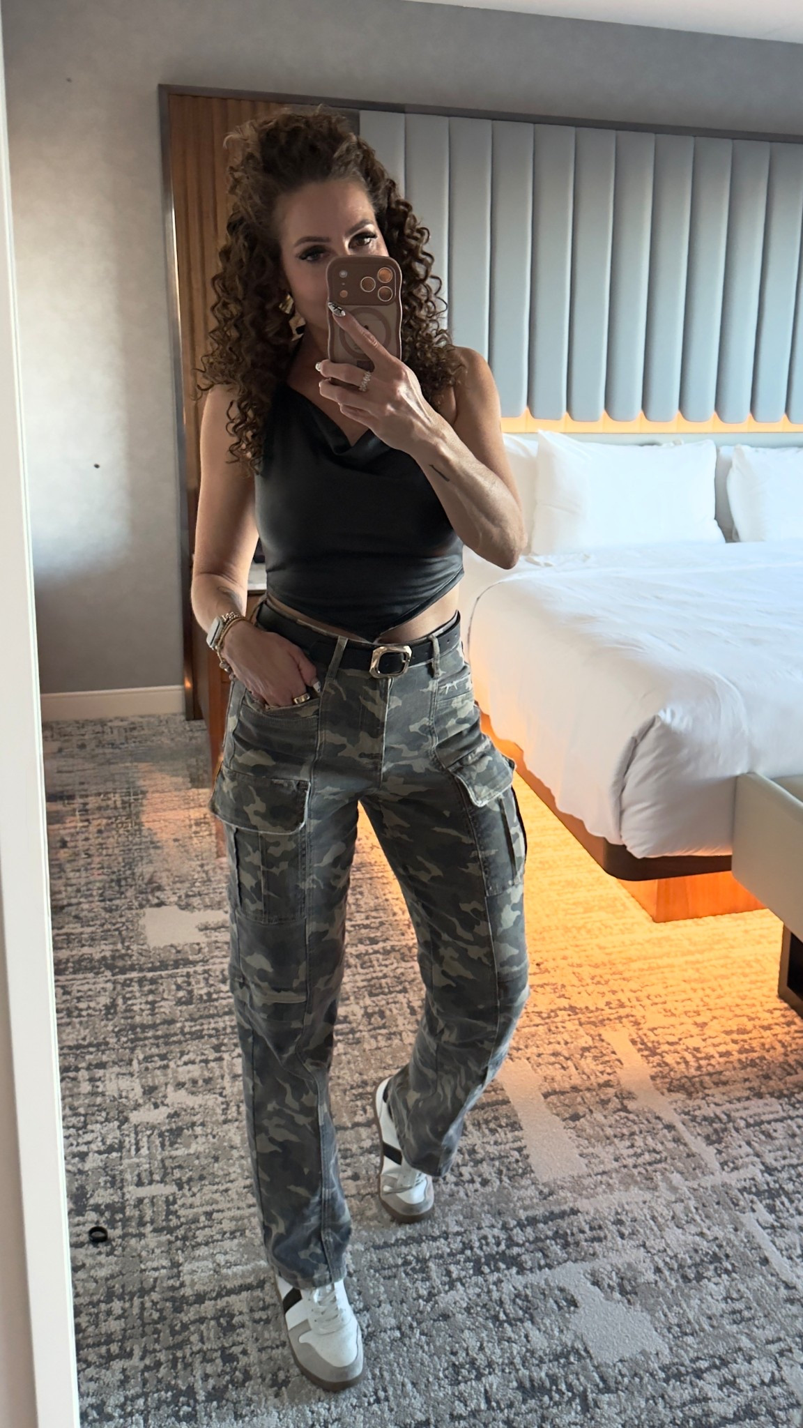 Camo cargos + leather top + samba 

#LTKStyleTip #LTKTravel #LTKShoeCrush