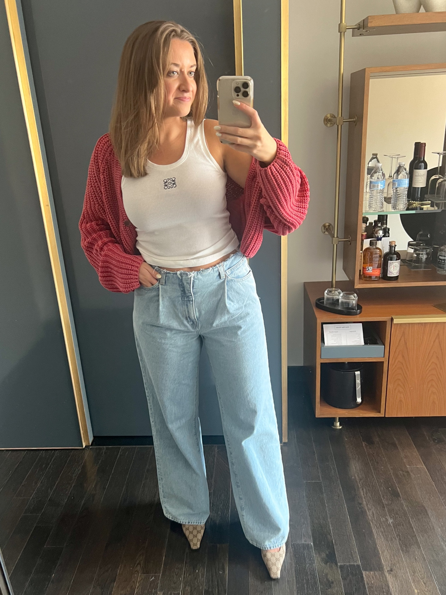 LTK Con Day 2! Love these jeans (I sized down) and have worn this tank enough to get my moneys worth!! Wearing a Medium tank & small in the cardigan. I’m an 8.5 and have a 38.5 in the gucci slingbacks -A

#LTKstyletip #LTKshoecrush #LTKfindsunder100