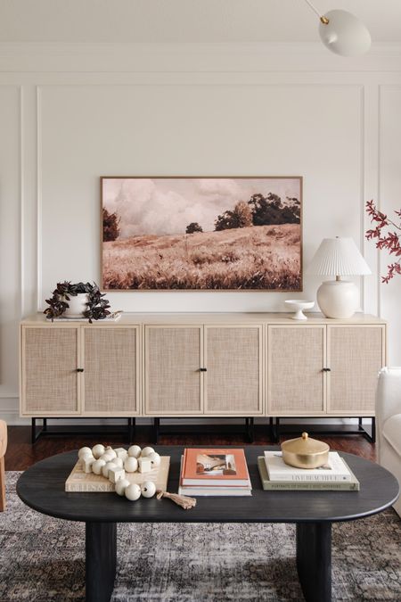 Accent cabinets to use as an extra wide media console! Just push 3 cabinets together for a high end look on a budget. It is also easy to move one and access cables if needed!

#LTKhome #LTKSeasonal #LTKsalealert