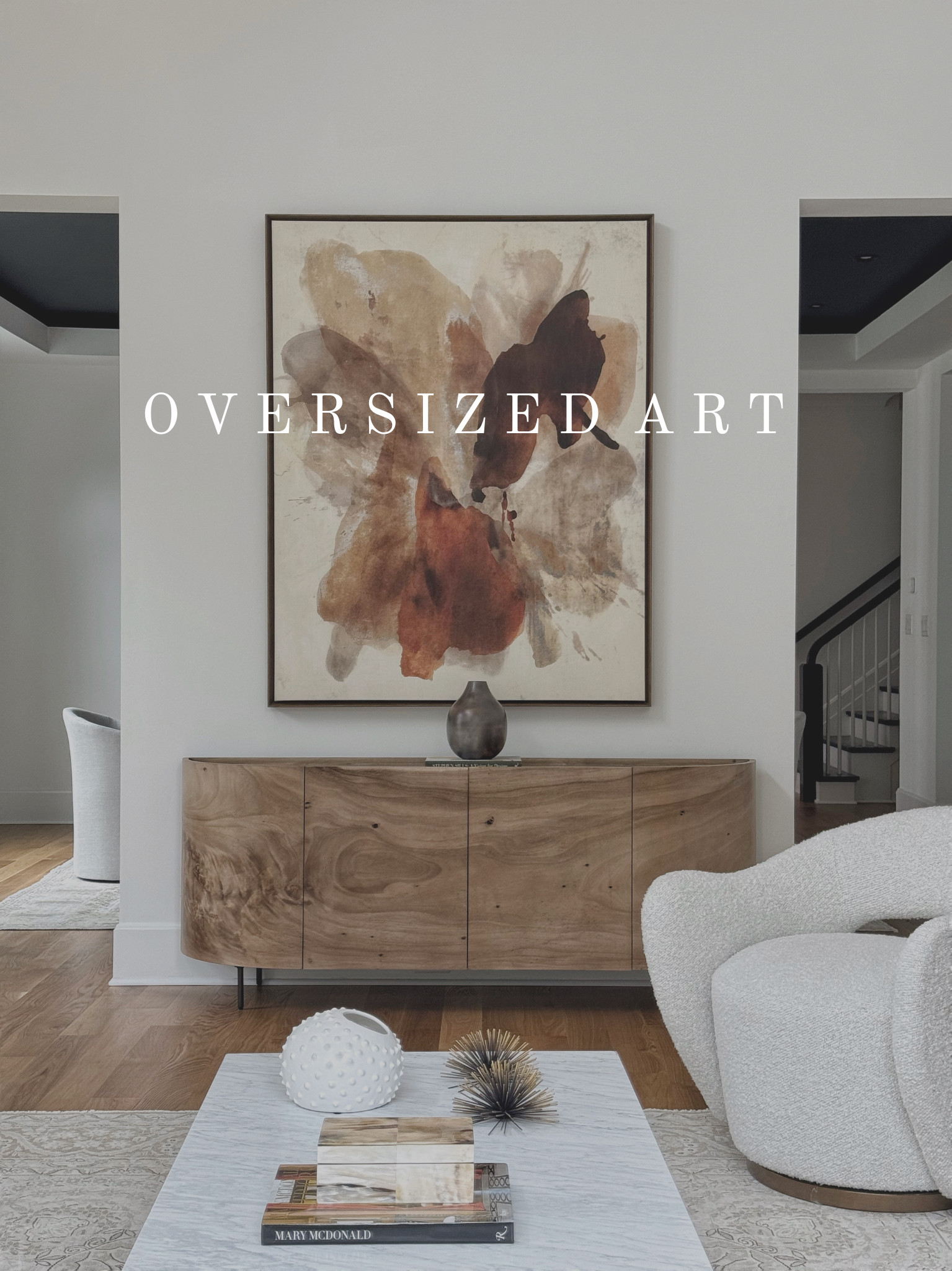 What size is considered oversized or extra-large art? Art pieces 60 inches and above on one side are typically classified as oversized or extra-large.

So many of you ask where we source our art, especially our large statement pieces. I understand that buying art online can be challenging — it's hard to gauge scale, proportions, and quality without seeing it in person. To help, I’m sharing my top tips for purchasing oversized art online. Save this post for future reference when you’re sourcing large art!
1. Don’t be fooled by too-good-to-be-true prices: Oversized art is expensive due to the sheer size and the potential risk of damage during shipping. If the price seems unusually low, it’s likely cutting corners somewhere. Invest a little more for better quality and a smoother shopping experience.
2. Unsure about sizing? Use the 2/3 Rule: As a general guideline, your artwork should cover at least 2/3 of the space you're decorating. Think 2/3 of the width of the wall or 2/3 of the length of the furniture the art will hang above.
3. Frame it for a more polished look: Framed art adds an extra touch of luxury and refinement to any space. Always opt for framed options when possible. (Right now, I'm loving floater frames — they offer a sleek, modern look that complements all types of art!) 

 

#LTKHome