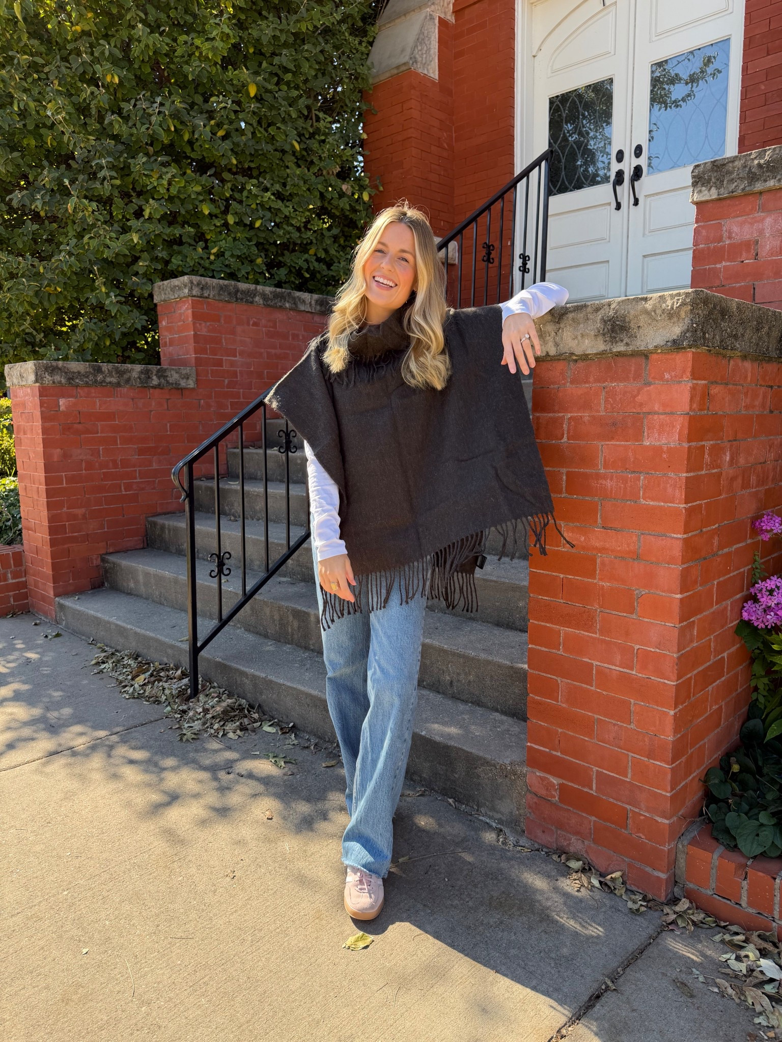 Fringe- trimmed poncho top for fall