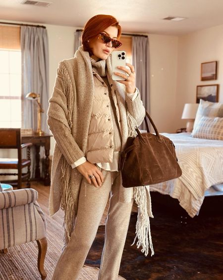 I am OBSESSED with this cashmere leisure set! I wore it for our travel day to Santa Fe and it is SUCH a chic and versatile look. The puffer vest really elevates the look and then I added this shawl for more warmth. You need something like this in your wardrobe and I love Brochu - I have never gotten rid of any of my Brochu pieces. They are truly an investment and they make you feel very put together. 

#LTKtravel #LTKHoliday #LTKworkwear