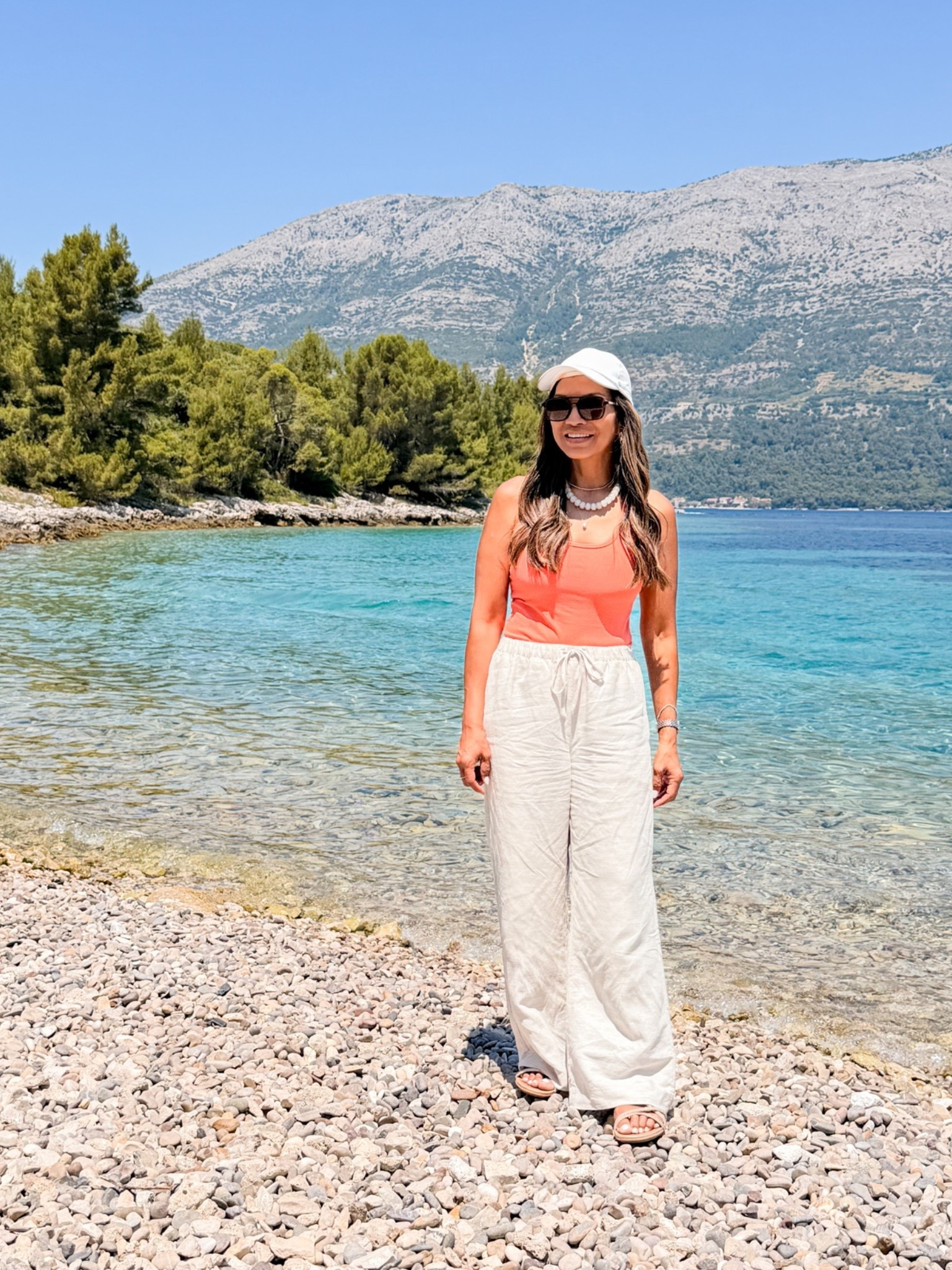 I’m 5’2” 118#ish for reference 
Europe outfit- I wore for a 4-hour buggy riding in Korcula island. 
Tank top with built in bra in small tts.
Linen pants that don’t wrinkle easily in small short length. Come in length options. Color is Undyed Ecru.
Sandals  I sized down-the comfiest. 
Accesories are linked.
Europe outfits, Travel outfit, over 50 style, midlife fashion, petite fashion,midlife women, affordable fashion, fashion over40

#LTKPetite #LTKTravel #LTKActive