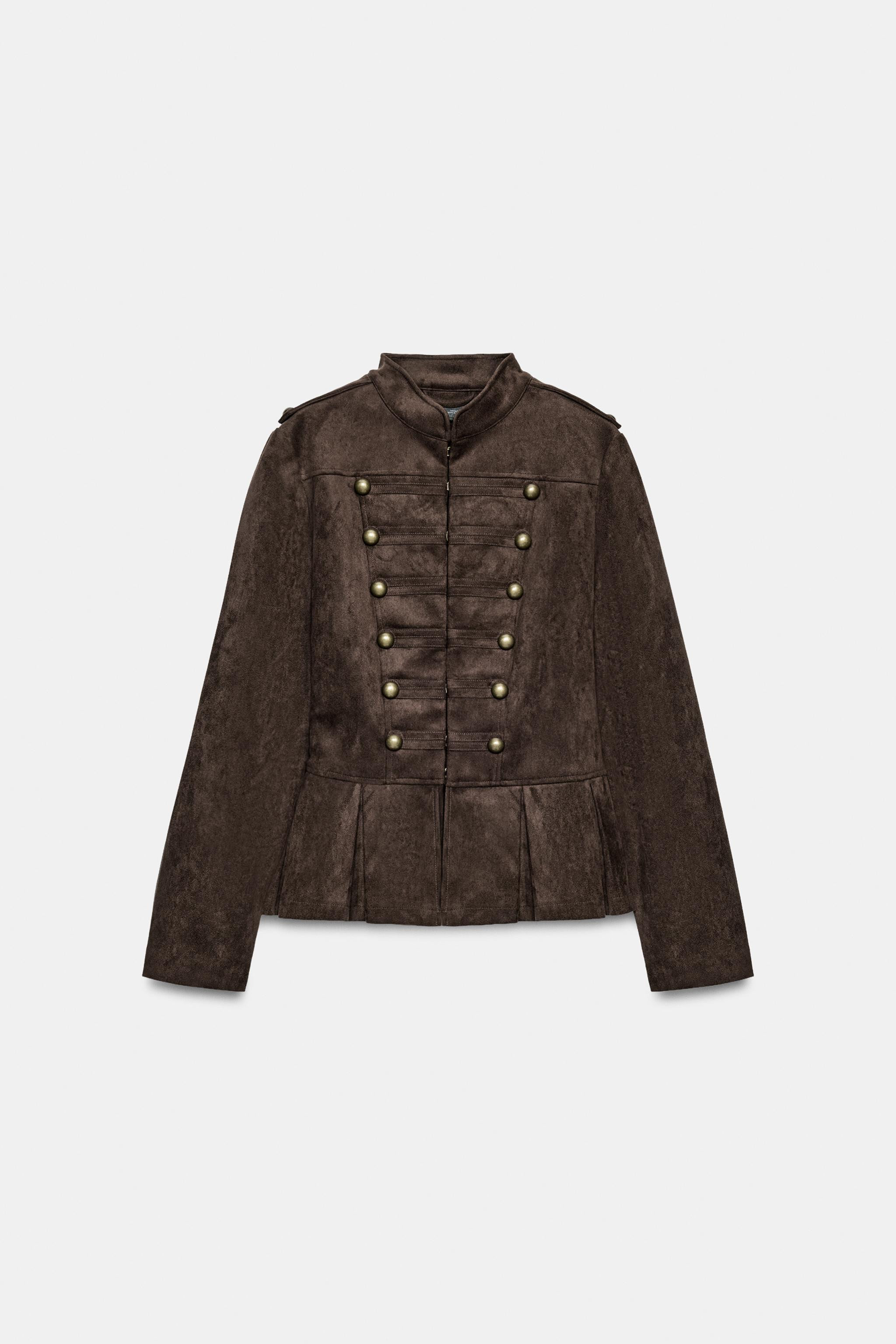 Jacke mit Stehkragen und langen \u00c4rmeln. Detail mit kontrastierenden Metallkn\u00f6pfen. Saum... | Zara DE