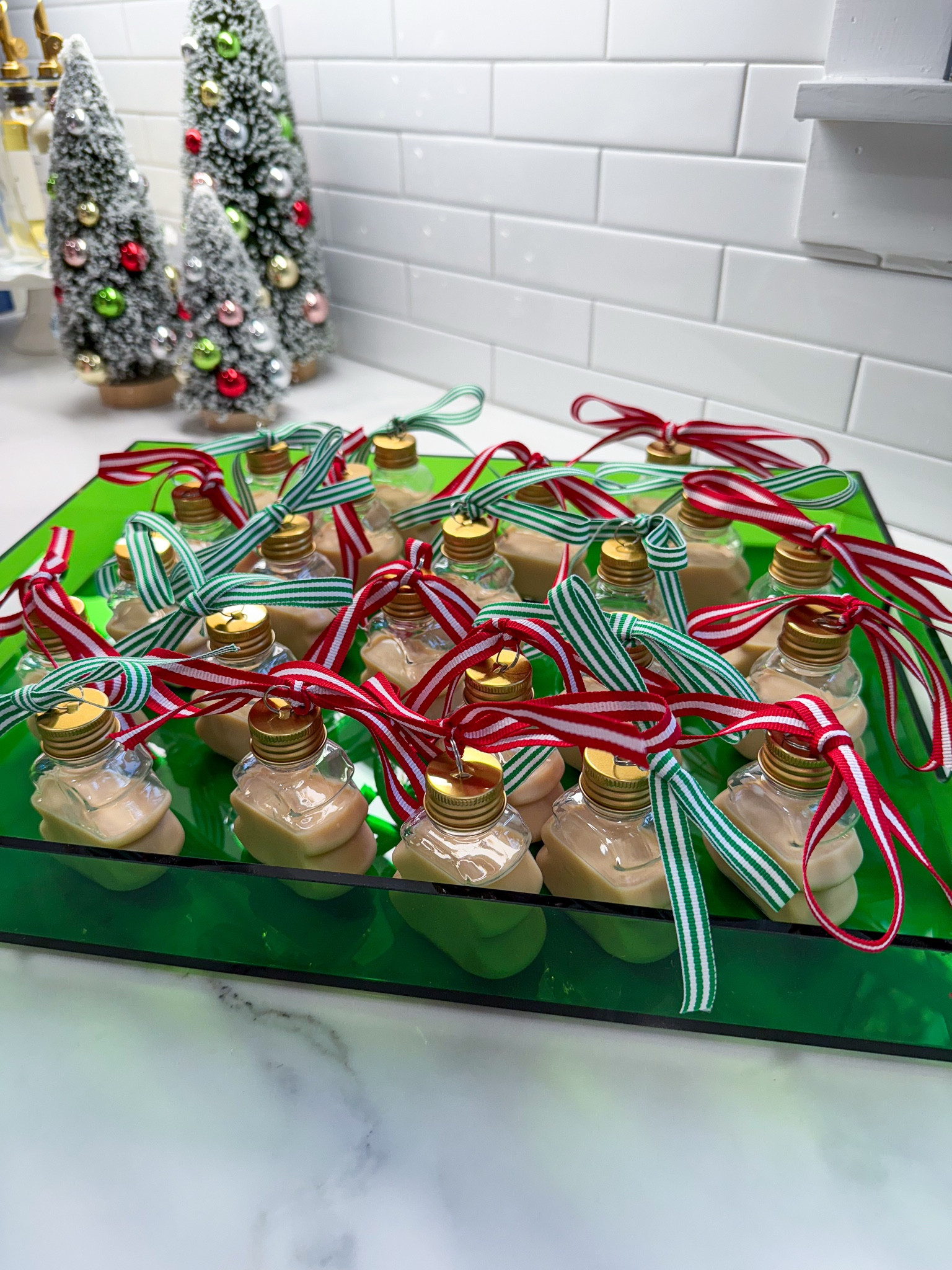 Christmas Party Idea! I made Cinnamon Toast Crunch shots, poured them into Christmas tree ornaments and then I tied a bow around the top of each Christmas tree ornament! They turned out so cute! My acrylic tray comes in a bunch of other colors too!

Holiday party, party ideas, Christmas tree ornament, party idea 

#LTKParties #LTKHome #LTKHoliday