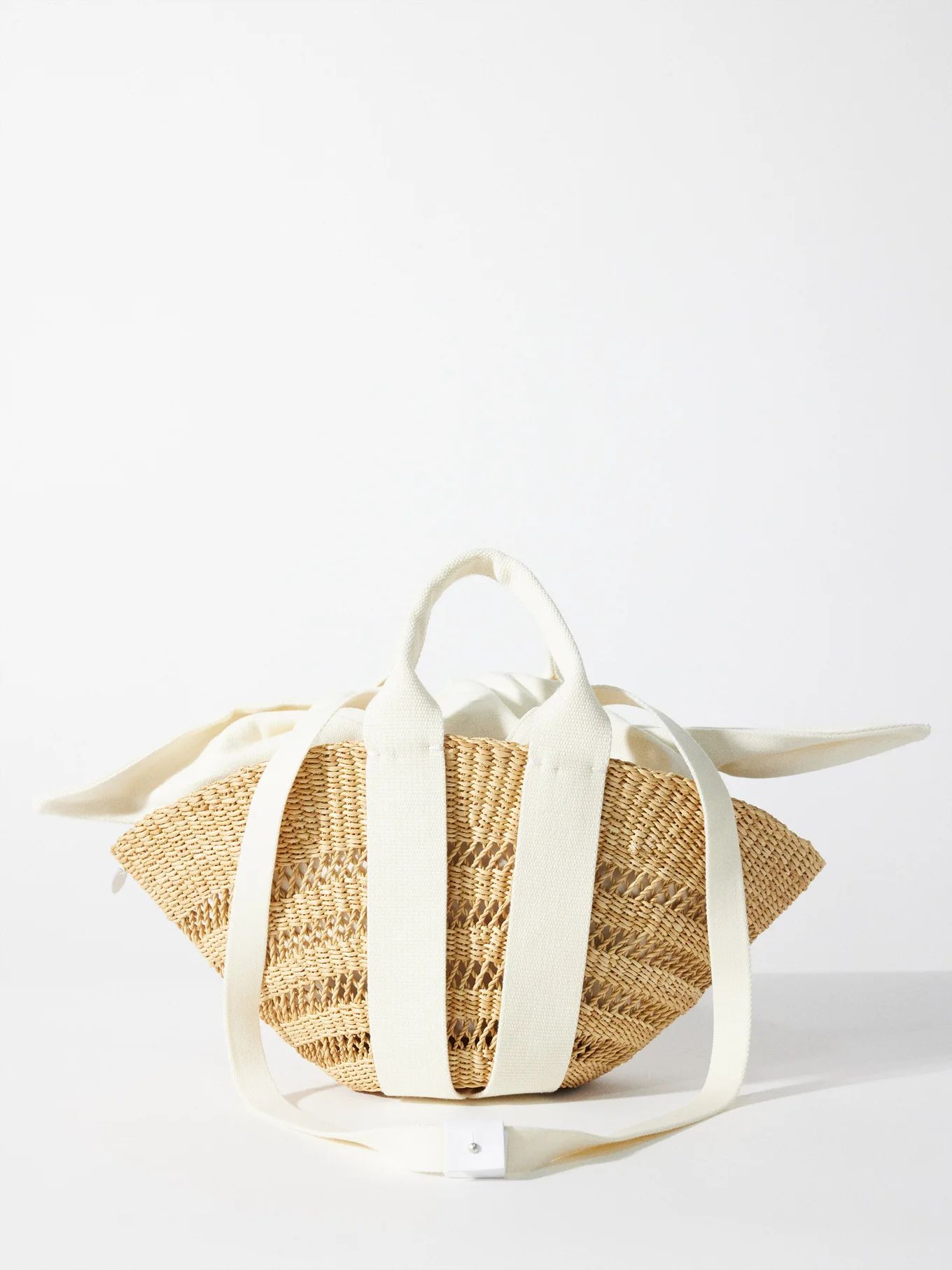 Sophie mini canvas-trim woven basket bag | Muuñ | Matches (UK)