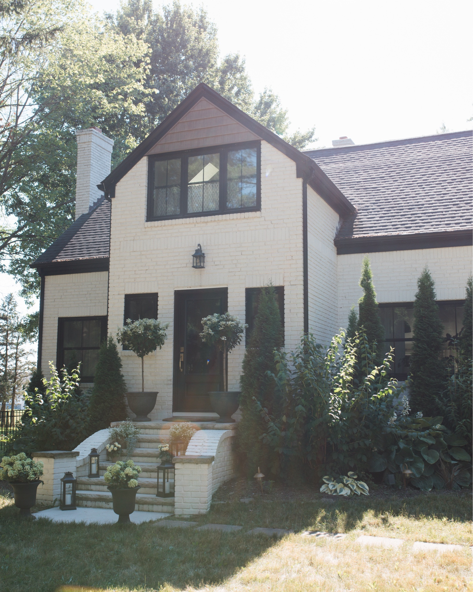 Shared our summer front porch on the blog today! Used the most beautiful planters and lanterns from @walmart #walmartpartner Love how it turned out! 🌼☀️ 

https://forthehome.blog/design/summer-front-porch

#LTKSeasonal #LTKHome