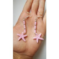 Handmade pink and silver dangle earings with a starfish charm | Etsy (US)