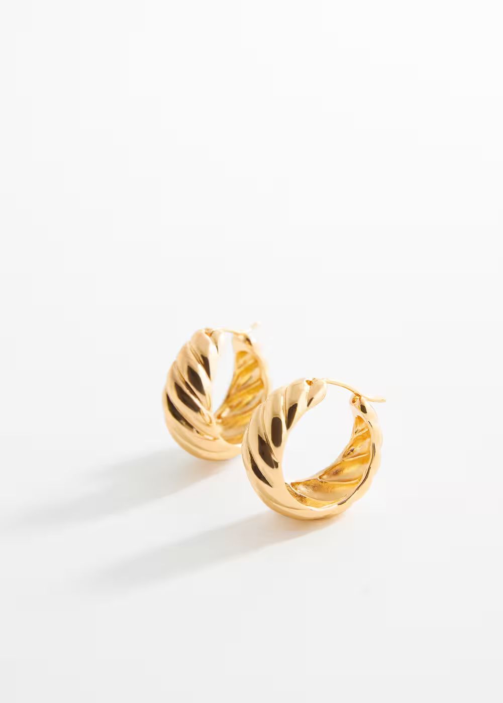 Intertwined hoop earrings -  Women | Mango USA | MANGO (US)