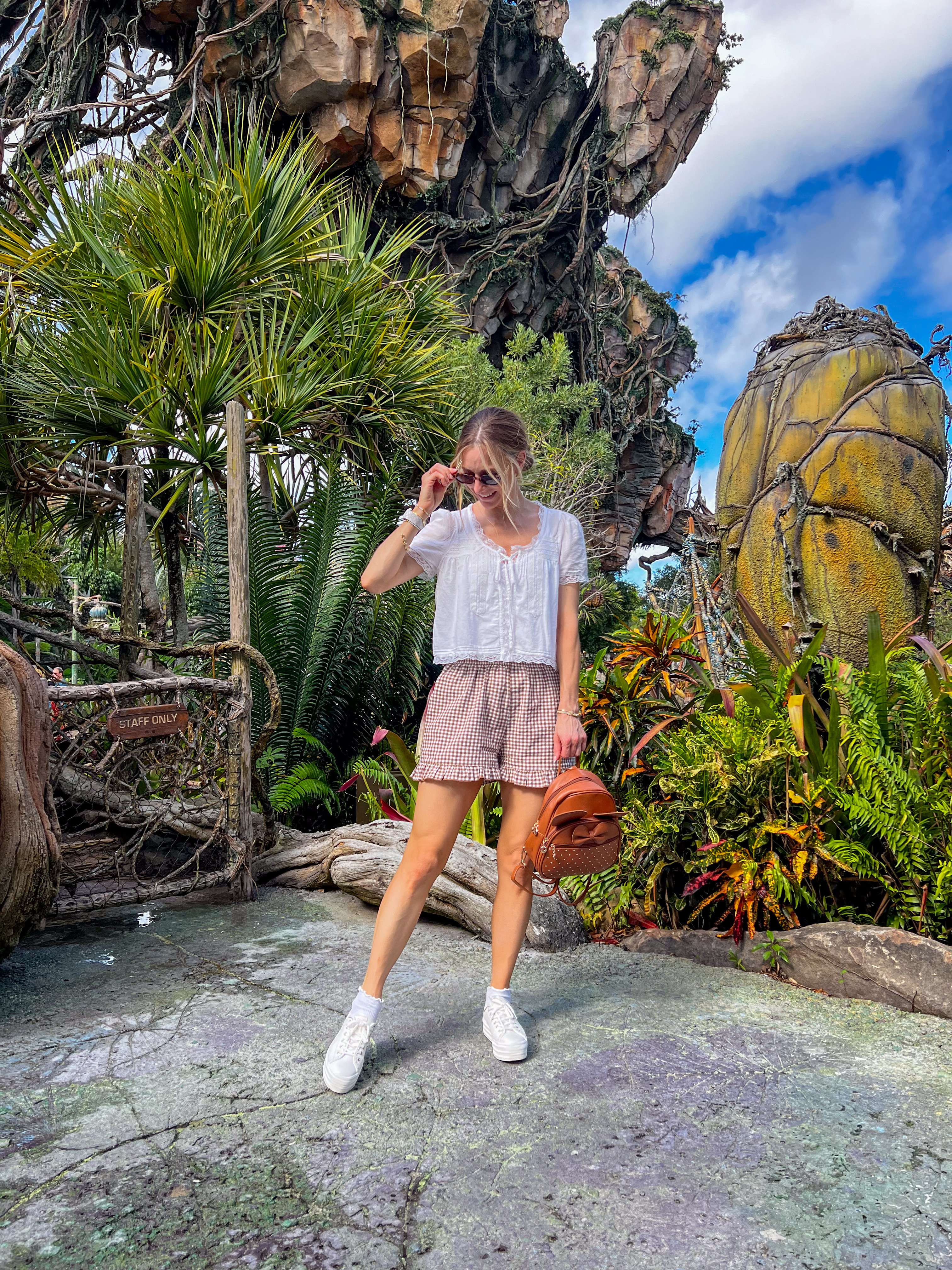 Exploring the park in these comfy boho blouses. Paired with gingham shorts and a cute Minnie backpack. You'll stay stylish and comfortable all day long! I'm in a medium in both the top and the shorts. Keds sneakers fit TTS.

 

 #LTKootd #LTKSeasonal #LTKOver40
