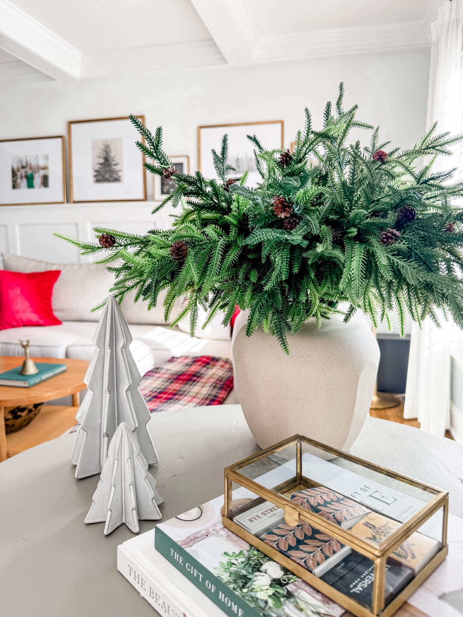 Artificial Norfolk pine branch stems 
Tree decor
Christmas decor
Holiday faux green stems
Holiday branch stems
Christmas greens
Trinket box
Red velvet throw pillow cover 
Christmas art print 
Wall decor 

#LTKSeasonal #LTKHome #LTKHoliday