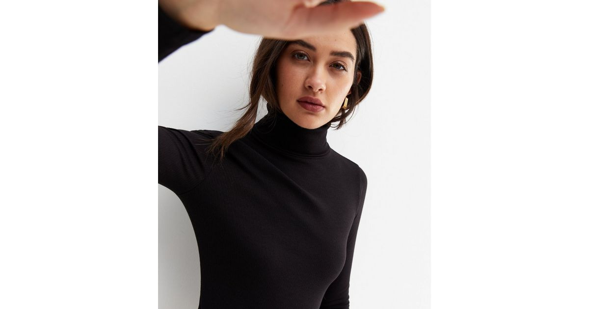 Black Ribbed Long Sleeve Roll Neck Top
						
						Add to Saved Items
						Remove from Saved It... | New Look (UK)