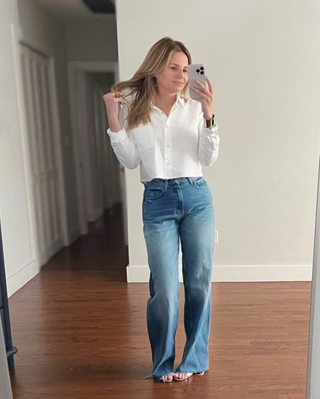 Everyday work look from everyday pieces in your closet that easily goes from day to night. I’m wearing a white long sleeve button down blouse that’s slightly boxy + cropped with wide leg medium wash jeans and silver strappy heeled sandals. I’m also wearing a silver cuff bracelet. 

*You can get this look by tucking in any tailored white button down shirt instead of the cropped shirt. Add a navy or gray blazer to dress this outfit up.

#LTKstyletip #LTKover40 #LTKworkwear
