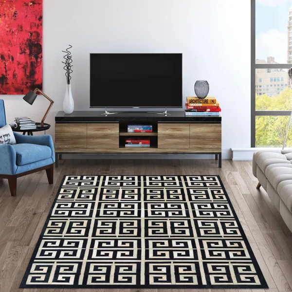 Haseeb Handcrafted Cowhide Black Area Rug | Wayfair North America