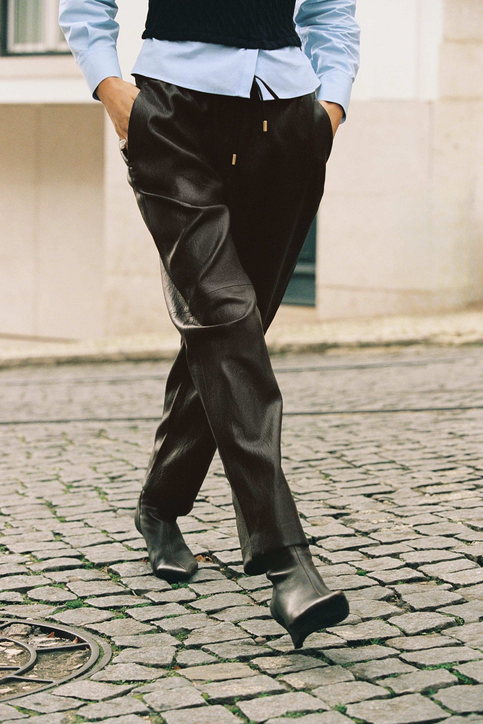 FAUX LEATHER TROUSERS WITH ELASTIC WAIST | Zara UK