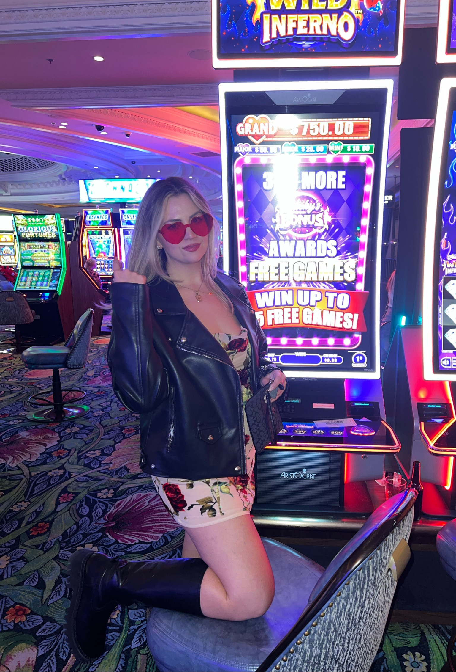 An edgy romantic Vegas look. Can we talk about the boots!!?? So comfy, walkable, and they pack a punch. Perfect fit for the Taylor Swift concert and then getting into trouble afterwards  💁‍♀️💗🌹

#vegas #moto #leather #minidress #roses #hearts #sunglasses

#LTKunder100 #LTKshoecrush #LTKstyletip