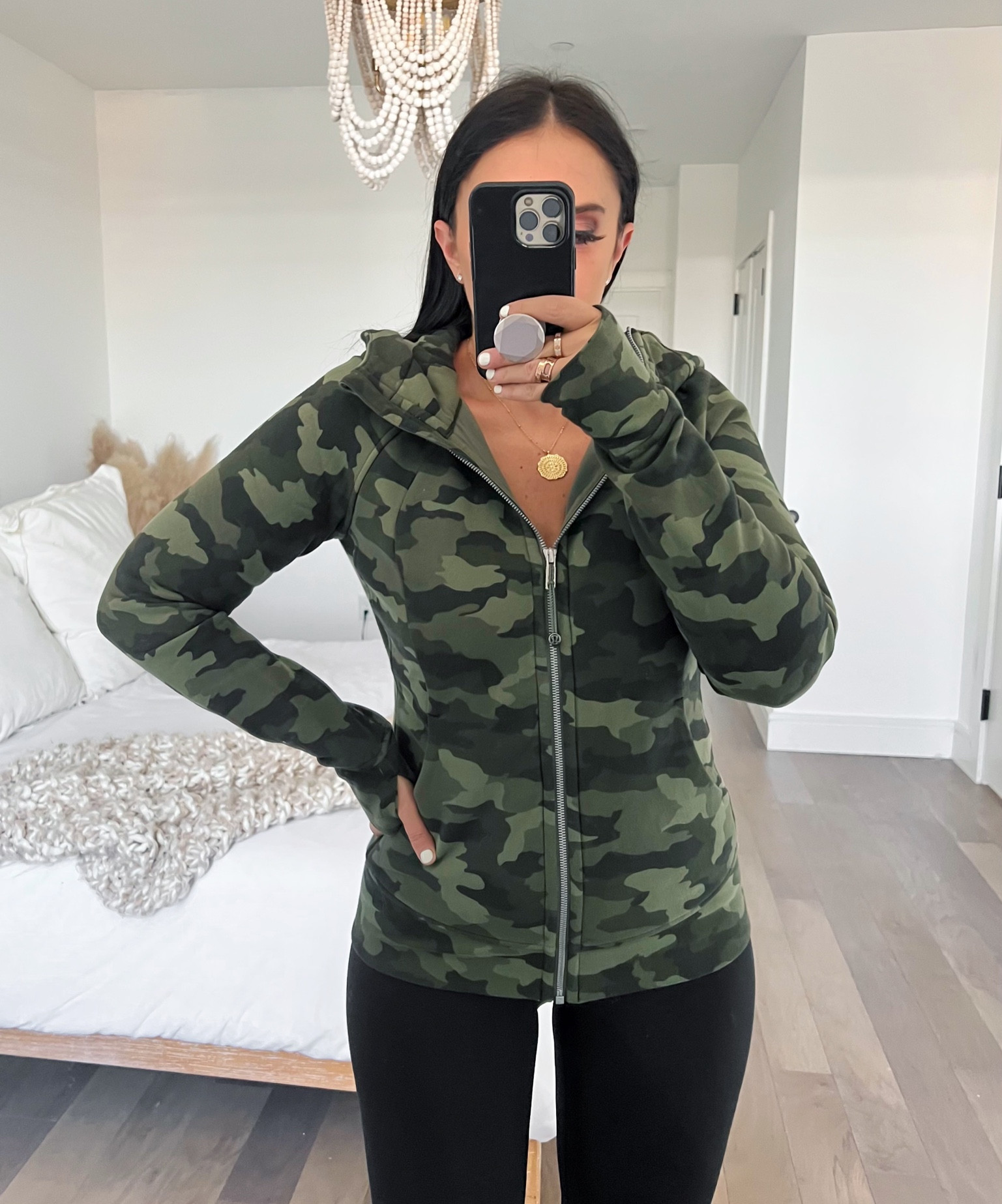 Lululemon camo zip up wearing size 6. Black lululemon leggings wearing size 6