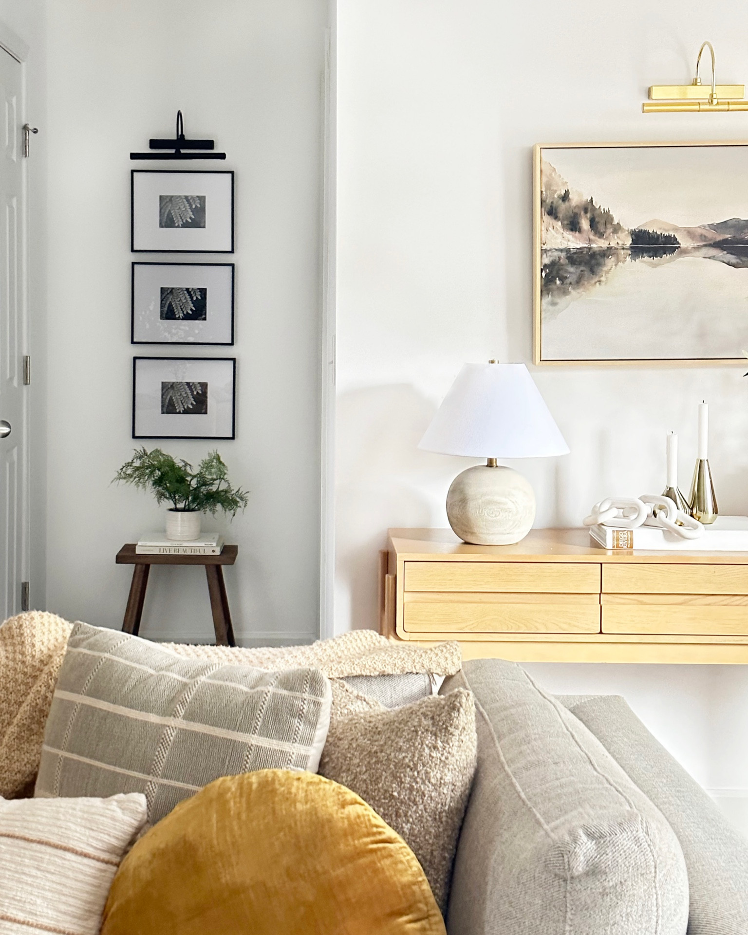 Grid Style Gallery Wall! Perfect weekend project, wireless art light! 
Black frames, hallway decor. 

#LTKhome #LTKunder100