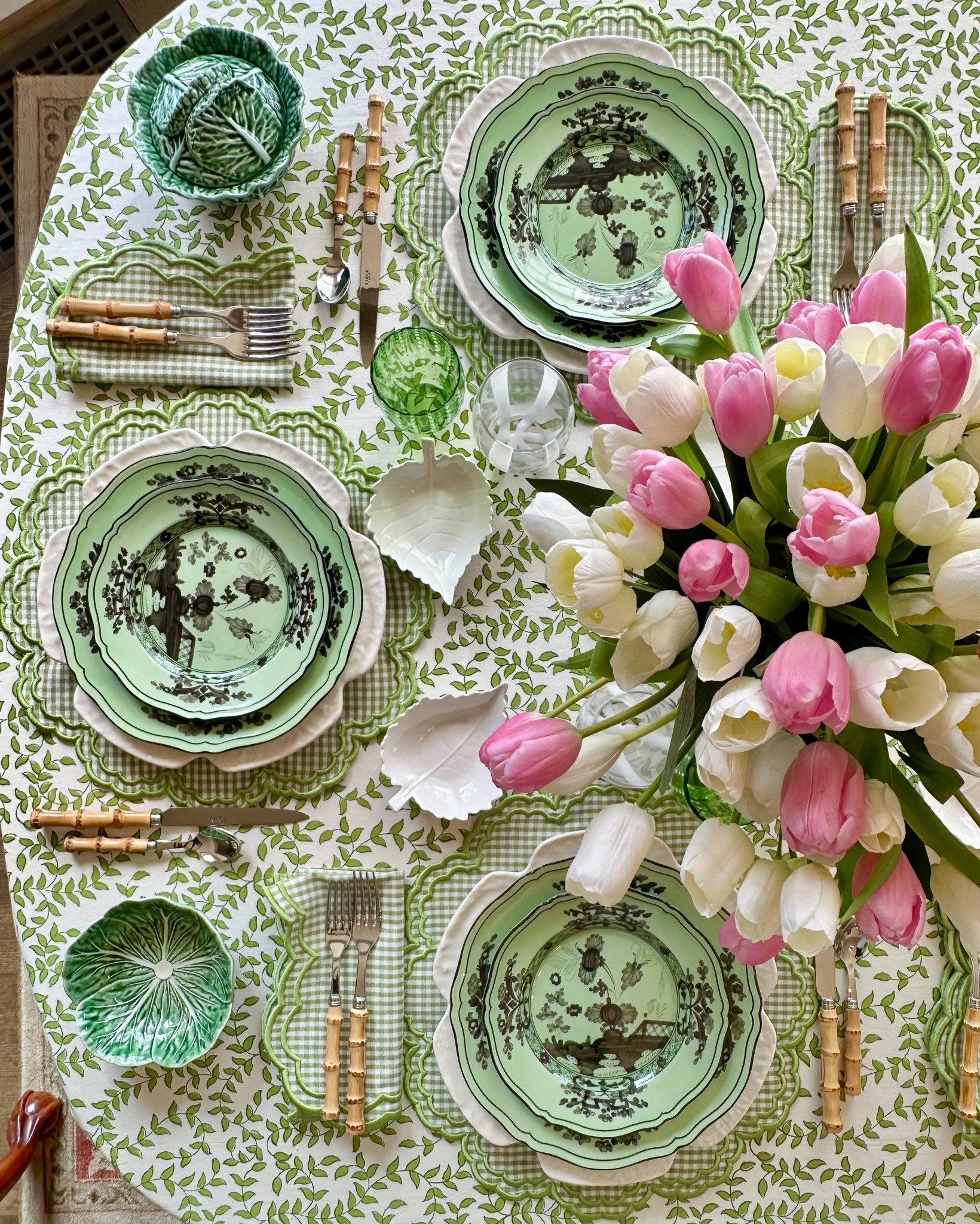 Spring table featuring block print linens, Ginori china, colorful glassware, cabbage chargers, cabbageware, bamboo flatware 

#LTKHome #LTKSeasonal #LTKfoodie
