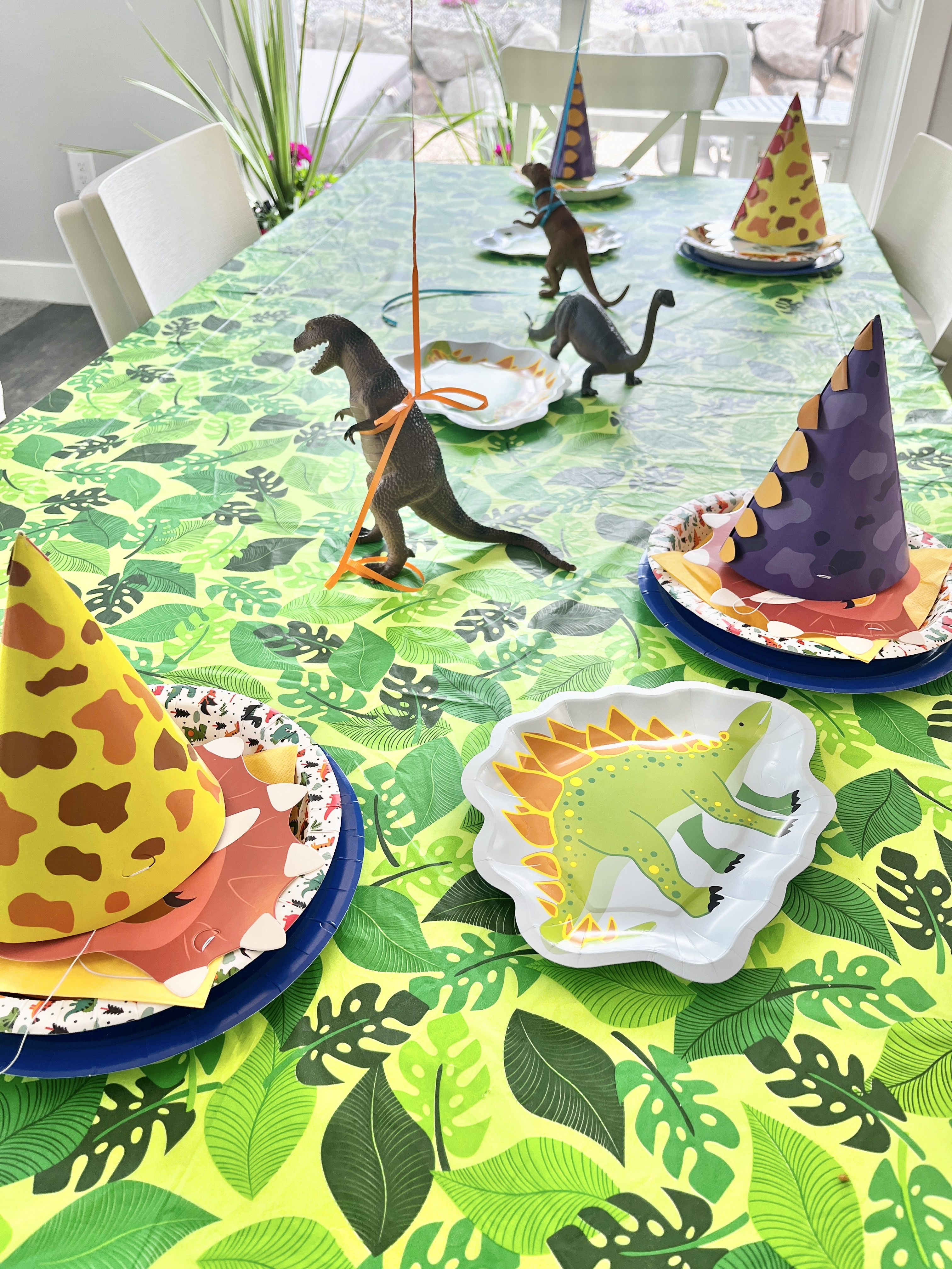 Tablescape and table setting party supplies for throwing the most roarsome dinosaur birthday party 🎂🦕🌋🦖

#LTKKids #LTKParties #LTKGiftGuide