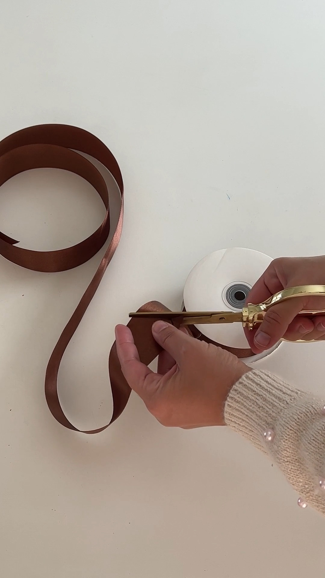 This brown satin ribbon just makes everything feel more thoughtful. ✨ It's the easiest way to elevate any gift or home decor detail like candleholders, glass stems, or a basket. 

The roll is 1.5 inches wide x 50 yards, so should last for multiple projects  

#LTKWedding #LTKFestival #LTKHome