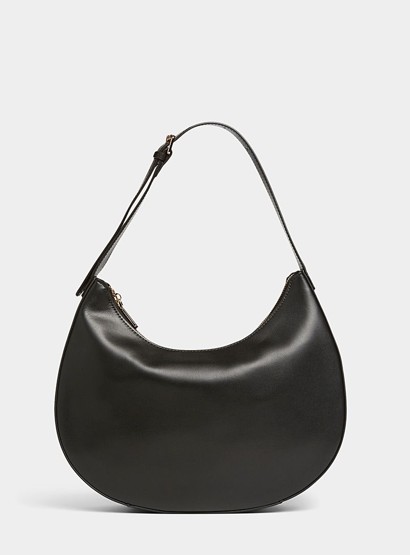 Oversized crescent leather bagExclusive collection from Italy | Simons