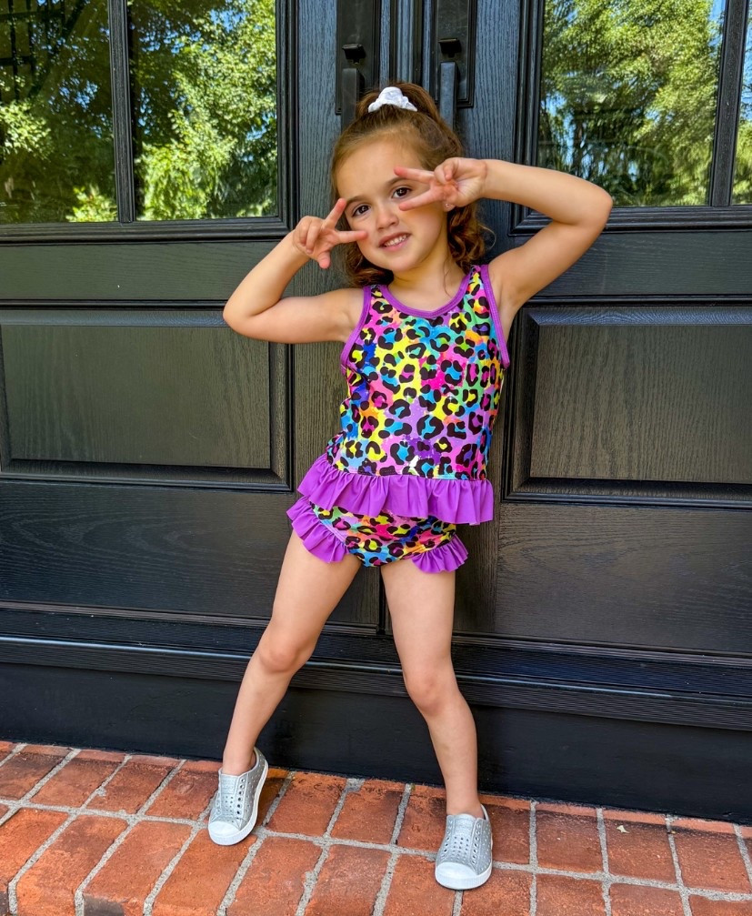 Can we talk about how cute this swimsuit is?! 💜💛🩵💚

My girl couldn't wait to wear it to the pool! The leopard print is adorable and reminds me of Lisa Frank 🐆 The ruffle details are so fun and perfect for all summer adventures. ☀️🌊

Beach days ✔️
Pool days ✔️
Vacation ready ✔️

#LTKSeasonal #LTKKids #LTKSwim