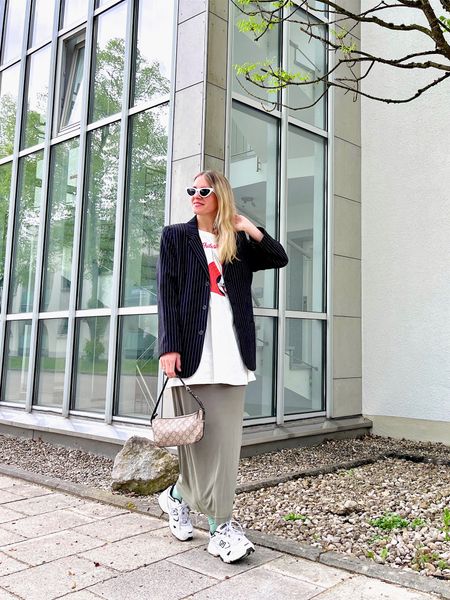 Graphic Tee. Fashion Blogger Girl by Style Blog Heartfelt Hunt. Girl with blond hair wearing a graphic tee, maxi slip dress, pinstriped blazer, white cat-eye sunglasses, vintage Gucci bag and New Balance sneakers. #colorfuloutfit #colorfulstyle #colorfulfashion #colorfullooks #fashionfun #cutespringoutfit #springfashion2023 #springlookbook #fitcheck #dailylooks #dailylookbook #contentcreator #microinfluencer #discoverunder20k