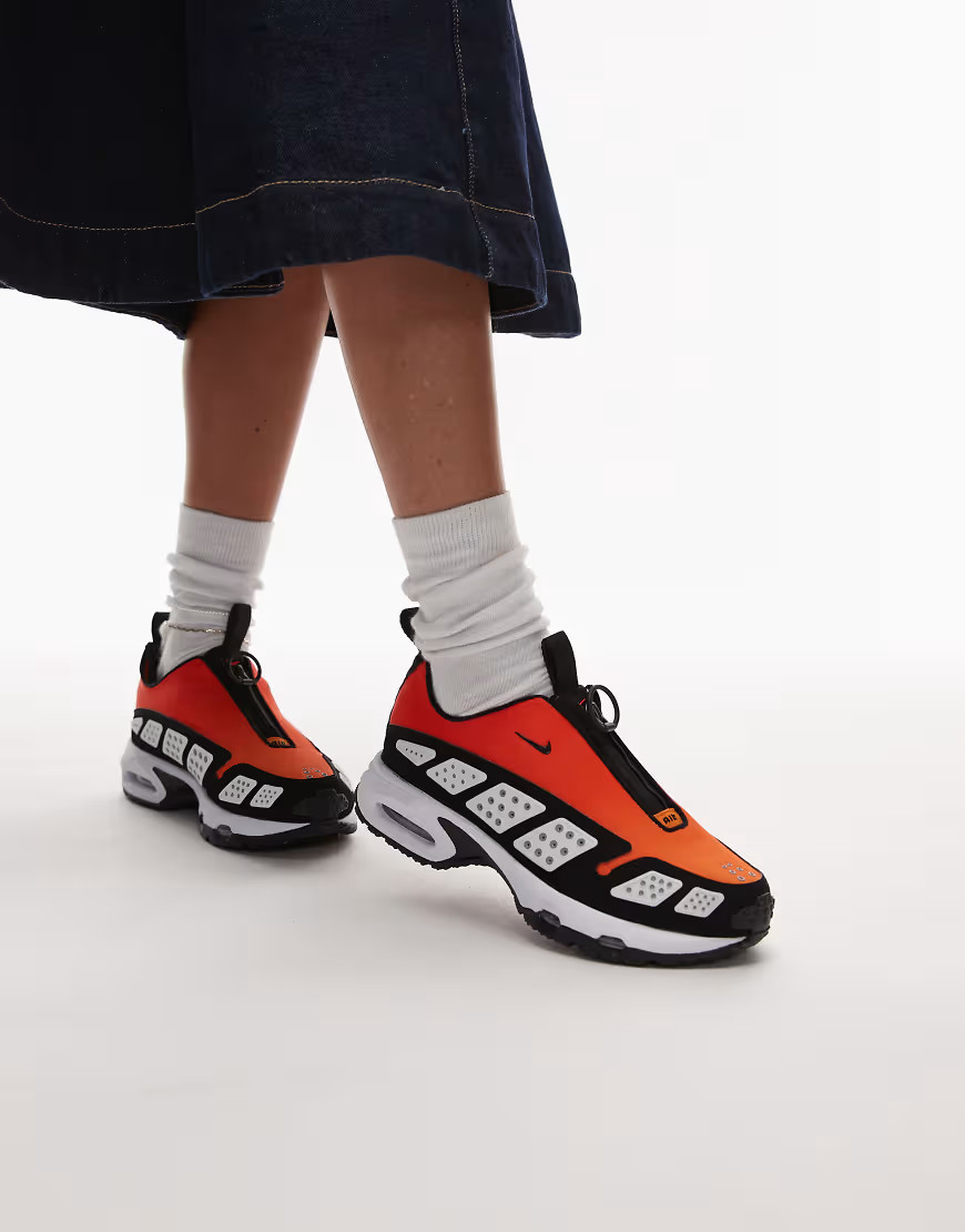 Nike Air Max SNDR unisex trainers in orange and black | ASOS (Global)