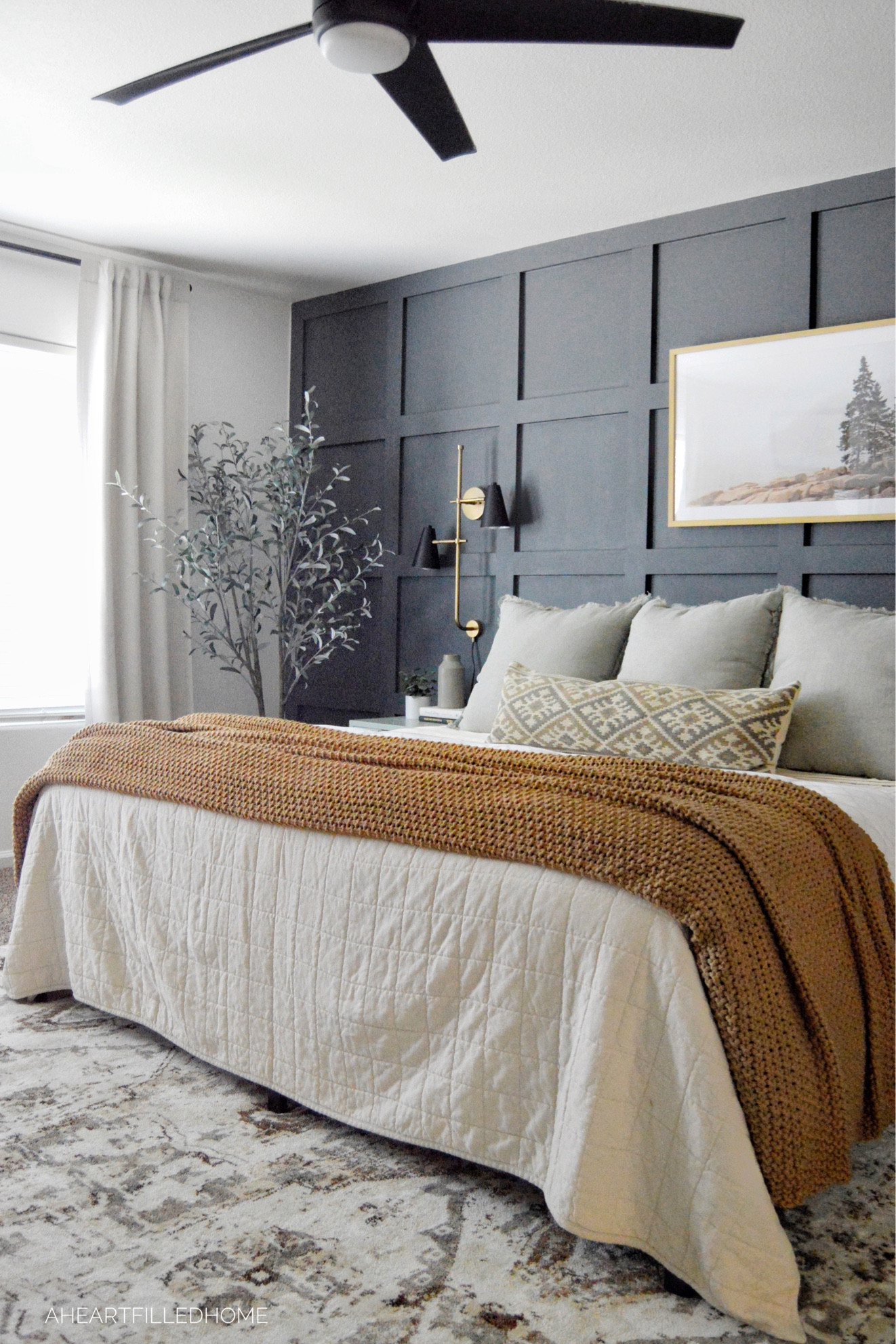 Master bedroom including cozy throw blanket, faux olive tree, quilt, bedding, curtains, area rug, and more!

#LTKhome #LTKunder100 #LTKunder50