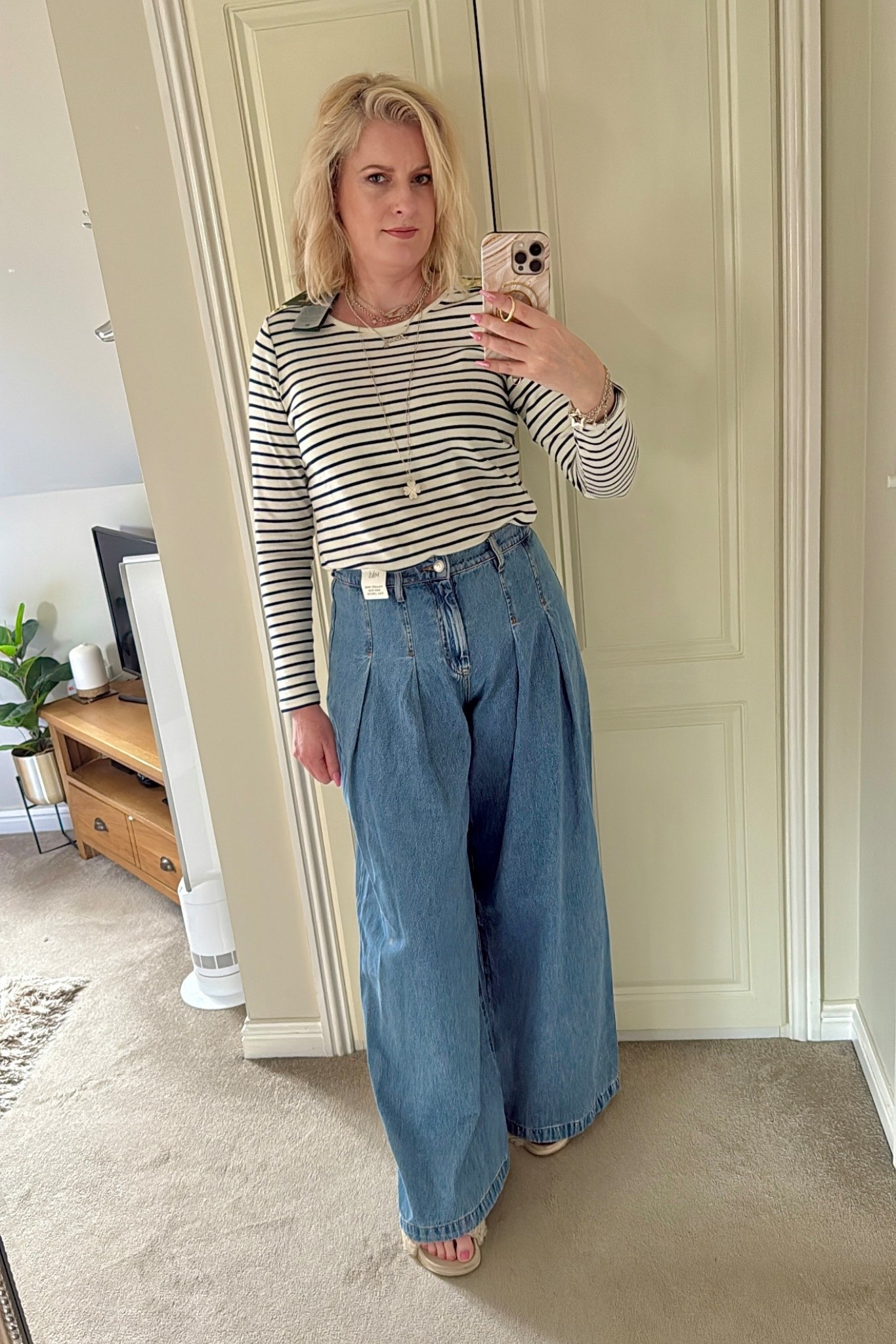 Hi everyone! These palazzo wide leg jeans were quite hit or miss on my stories when I did a poll. I quite liked them but they’re quite different from my usual style. They have pleats across the front & supportive around the tummy area & pulled me in. I think they’re look great with trainers or slides & could be worn most seasons. They’re definitely a style that’s on trend. Also available in tall  



U.K. blogger, high street, trousers, casual, trending, M&S, Marks & Spencer, midsize. 

#LTKstyletip #LTKspring #LTKuk