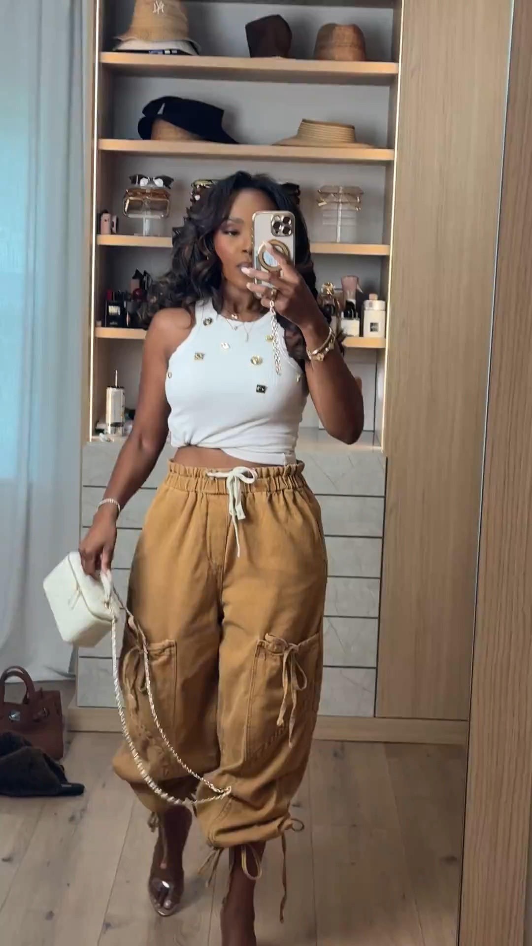 Hi Babes! 🤎✨

This is the perfect outfit when you want to be comfortable but still look put together. The cargo pants are lightweight with the cutest relaxed fit, and paired with a simple high-neck tank, it's an effortless look you'll reach for over and over.

✨ FIT DETAILS
• High-neck fitted tank
• Relaxed cargo jogger pants
• Adjustable drawstring waist
• Lightweight and comfortable
• True to size

✨ WHERE TO WEAR THIS
• Running errands
• Weekend outings
• Casual lunch dates
• Travel days
• School drop-off & pickup

The kind of outfit that looks elevated without trying too hard.

Everything is linked below!

xx Kira | IG: KirasFashionFinds

Measurements: 5'4" | 140 lbs | Size Small

#LTKgrwm #LTKootd #LTKPetite