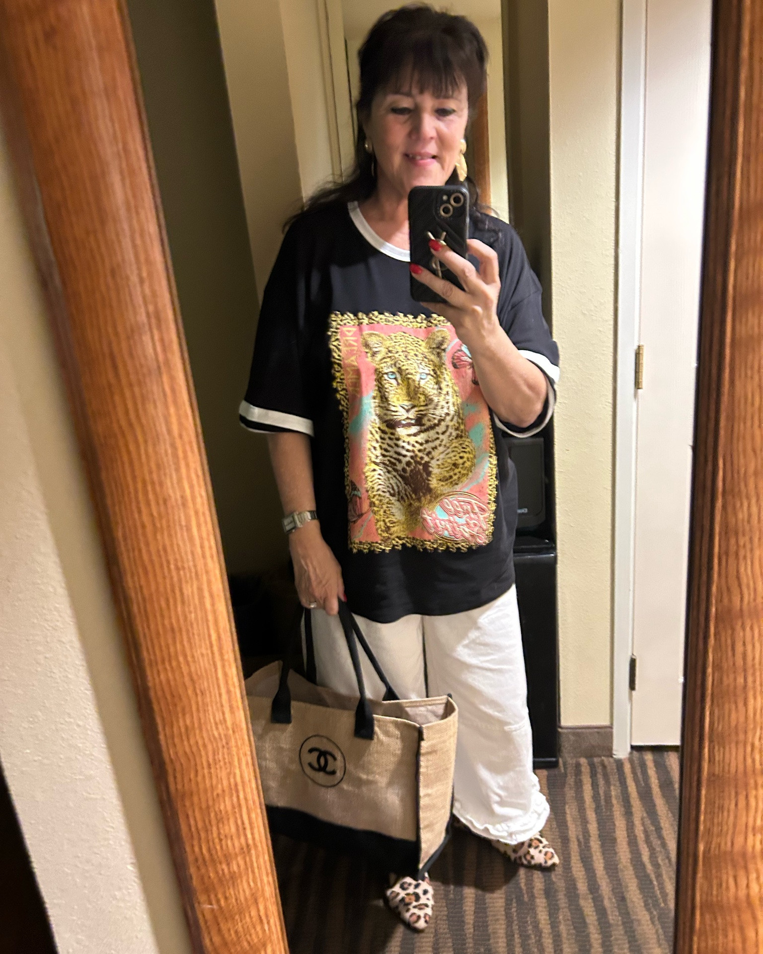 travel day looks can still be cute and comfy!! ✈️🖤
heading home in white pants, a fun tee, and my favorite tote. simple, easy, and still put together. i always love an outfit that feels good all day but still has a little style.
always be confident!! what do you think of this travel day look? #travelstyle #over50fashion #midlifestyle #agelessfashion #thewillowtree

#LTKgrwm #LTKvlog #LTKTravel