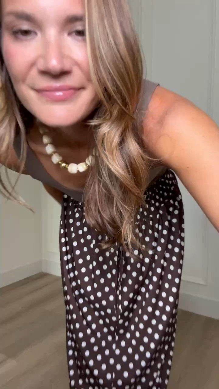This polka dot midi skirt is such a versatile piece for dressing up or down. Paired with a fitted tank, it creates an effortless look that’s perfect for date nights, brunch, the office, or transitioning into fall.

Polka dot midi skirt, brown midi skirt, satin midi skirt, fitted tank outfit, elevated basics, date night outfit, work outfit, fall transition style, feminine outfit, classic fashion, chic everyday style, tall girl fashion, tall friendly outfit, StangandCo

#LTKootd #LTKSeasonal #LTKTall