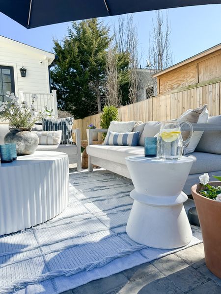 I refreshed our patio space with pieces from the Joss and Main spring edit! My favorite pieces are the terracotta planter, white modern outdoor accent table, blue glassware, tumbler, white ceramic serving bowk, blue and white indoor/outdoor blue and white fringe rug. Coastal patio design, home decor, outdoor decor. @JossandMain #JossandMainPartner #JMSpringEdit #liketkit #liketkit @shop.ltk

#LTKhome #LTKFind #LTKSeasonal