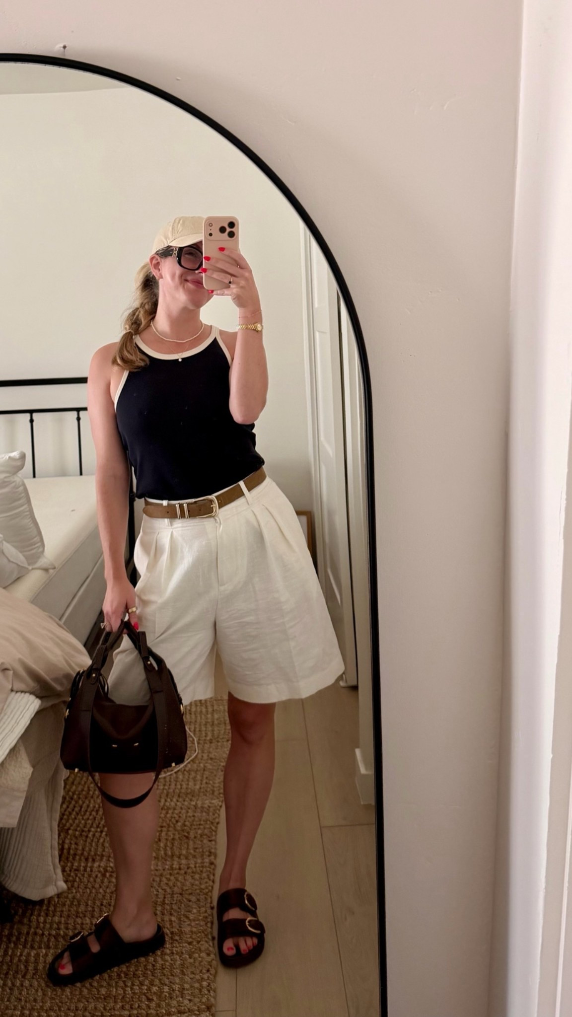 Easy breezy summer outfits are my favorite 🤍

A two-tone tank, white linen shorts, comfy sandals, and my favorite chocolate brown bag. Simple pieces that somehow always feel put together.

Everything is linked below ✨

#LTKootd #LTKSeasonal #LTKWorkwear