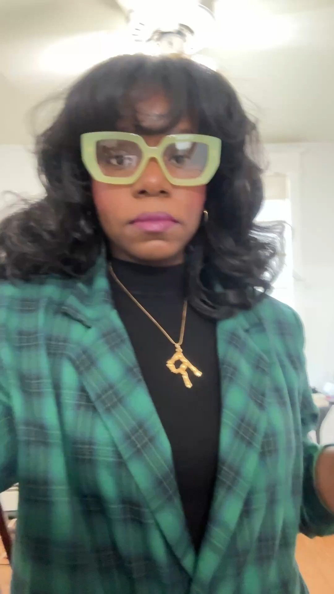 Plaid blazer, black shirt, green blue light blocking glasses, with necklace. 

#LTKStyleTip #LTKMidsize