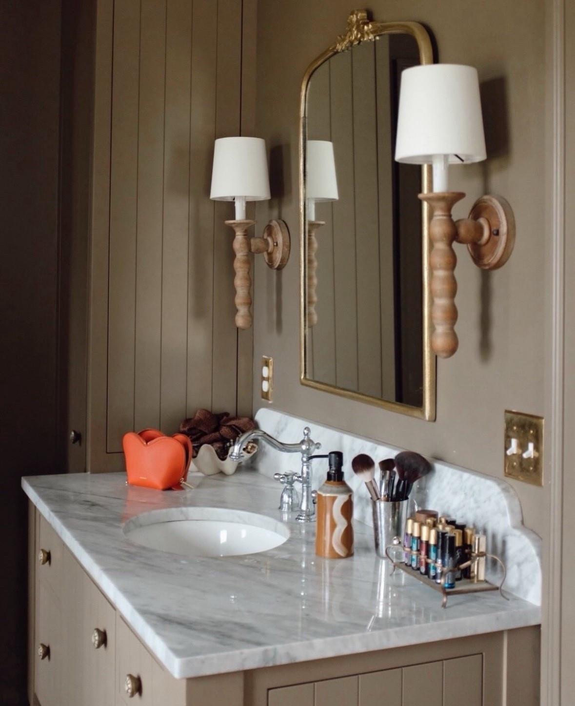 Primary bathroom sconces, mother of pearl knobs, mirror and more!

#LTKHome #LTKOver40 #LTKselfcare