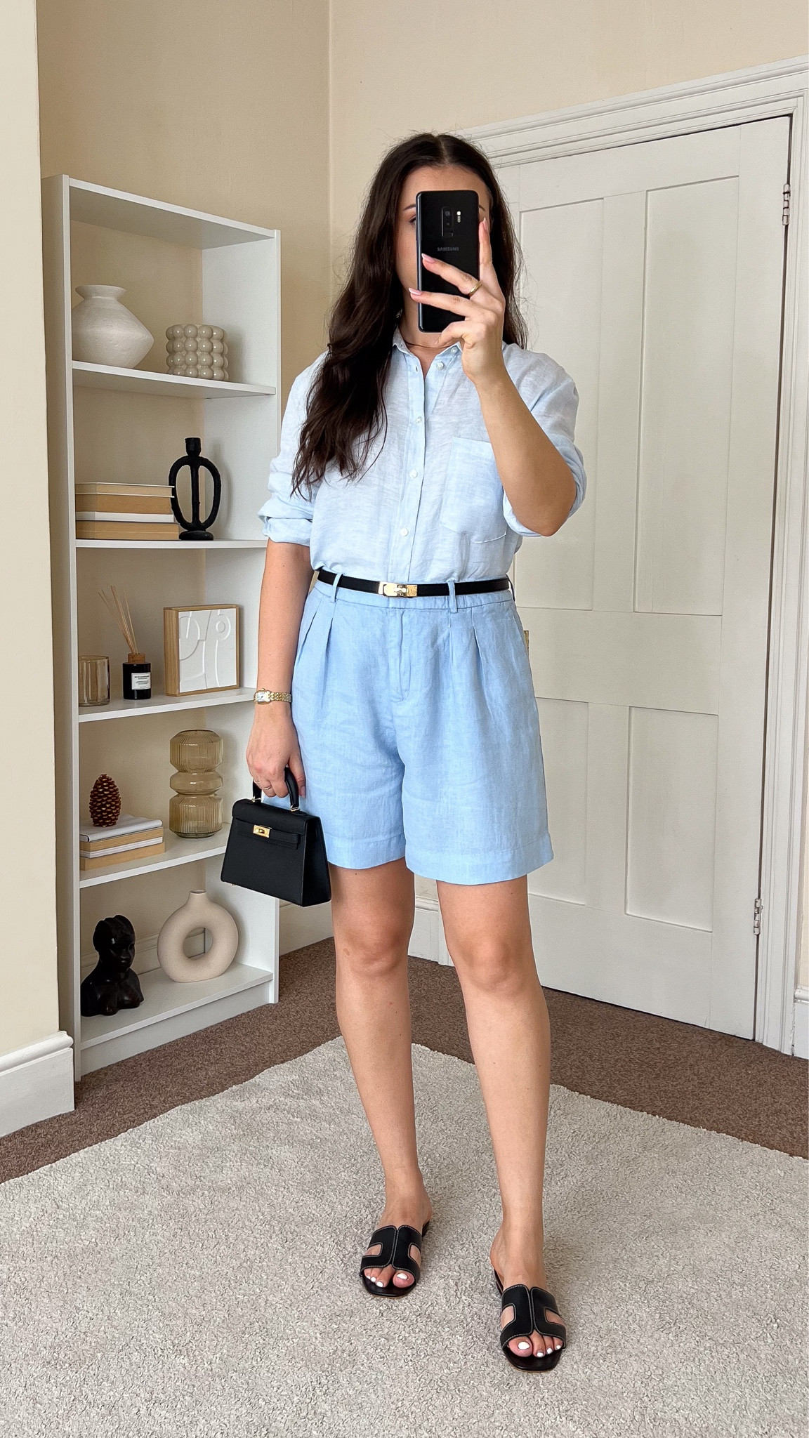 Casual & chic summer outfit. Shirt is H&M, wearing size S. Shorts are Mango, wearing size UK10. Bag is Totes Luxe Uk.

#LTKeurope #LTKsummer #LTKuk