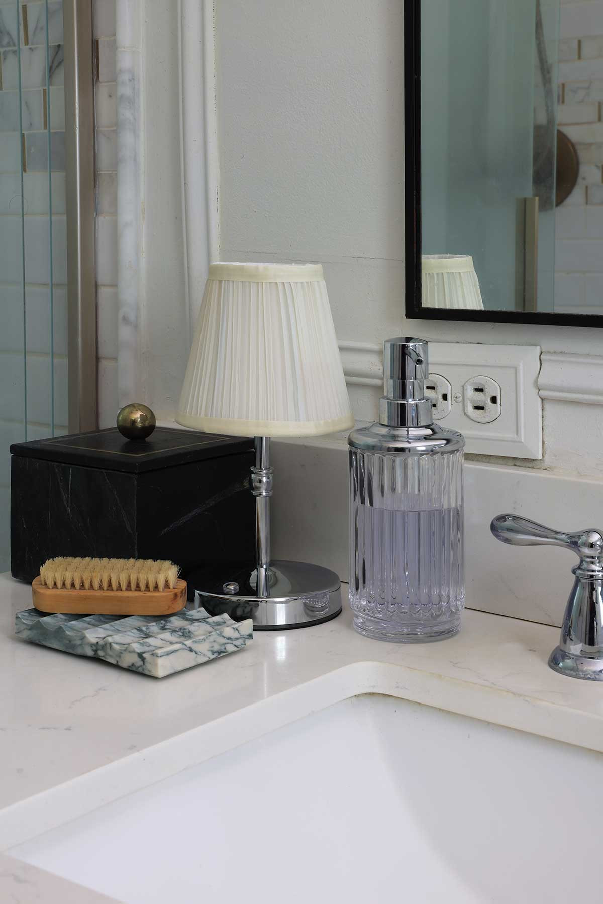 Bathroom vanity accessories | Cordless battery-powered lamp, green marbled soap dish, hand soap pump, and marble box. 

 #LTKHome