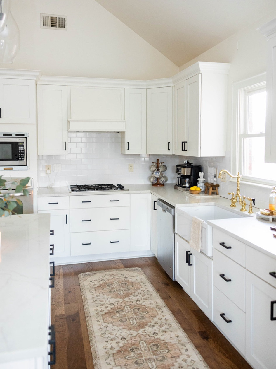 Spring kitchen ideas // farmhouse sink // brass hardware and faucet // coffee station 

#LTKunder100 #LTKhome #LTKunder50